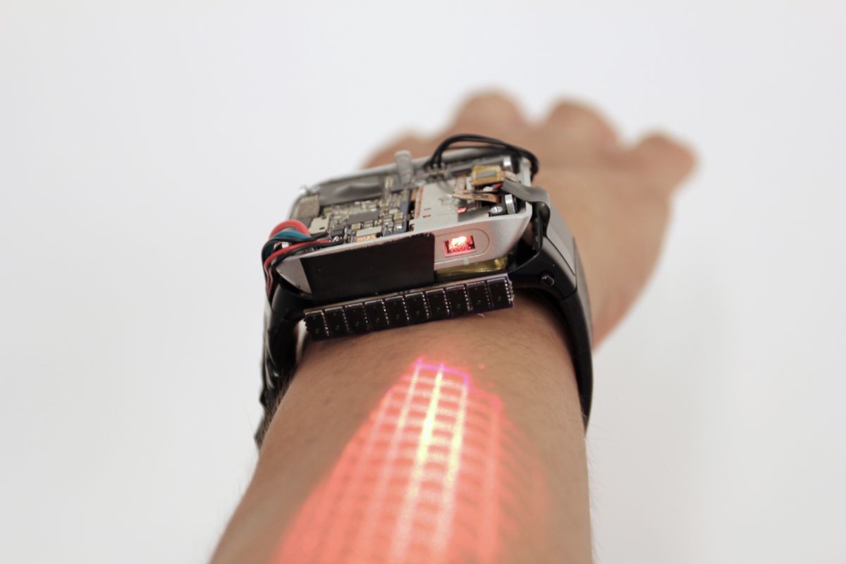 Smartwatch không cần màn hình, quẹt cảm ứng luôn ngay trên cổ tay - Ảnh 3. Smartwatch không cần màn hình, quẹt cảm ứng luôn ngay trên cổ tay - Ảnh 3.