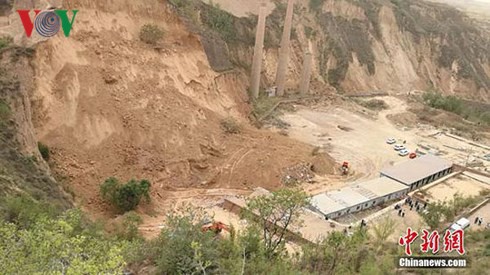 9 người bị chôn vùi trong vụ lở đất nghiêm trọng tại Trung Quốc - Ảnh 1.