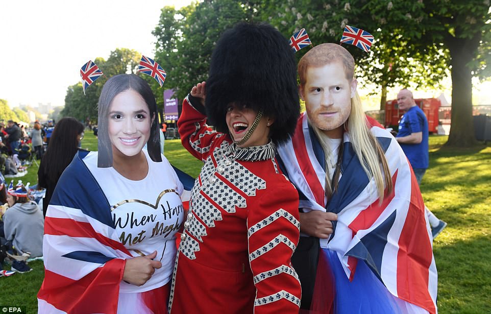 Royal enthusiasts pictured on the Long Walk ahead of the royal wedding wearing Union Jack flags and a Queen's Guard outfitÂ Â 