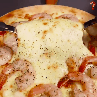 Chiếc pizza đánh lừa mọi ánh mắt nhưng có phần nhân vô cùng tuyệt hảo - Ảnh 2. Chiếc pizza đánh lừa mọi ánh mắt nhưng có phần nhân vô cùng tuyệt hảo - Ảnh 2.