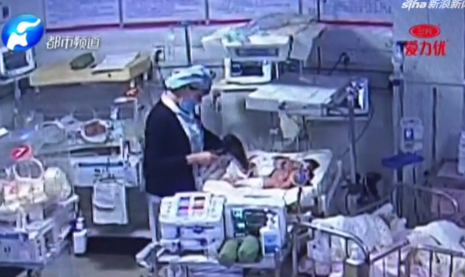 Trung Quốc: Nữ y tá quên tắt máy sấy tóc, bé sơ sinh 4 ngày tuổi bị bỏng nặng, phải cưa chân - Ảnh 1.