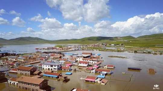 Lũ lụt Trung Quốc: Hàng chục người chết, thiệt hại 3,87 tỉ USD - Ảnh 1.