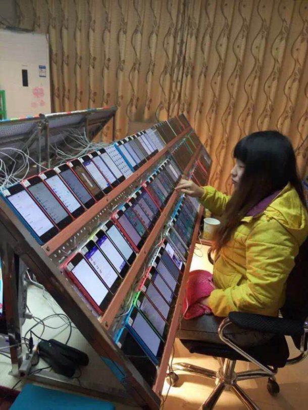 Nhìn chị gái dùng cả trăm chiếc iPhone để tăng hạng App Store khiến fan cày view cho idol cũng phải quỳ lạy - Ảnh 1.