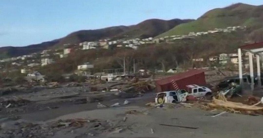 Núi đồ ăn cứu trợ siêu bão thối rữa trong bãi xe sau 11 tháng - Ảnh 2.