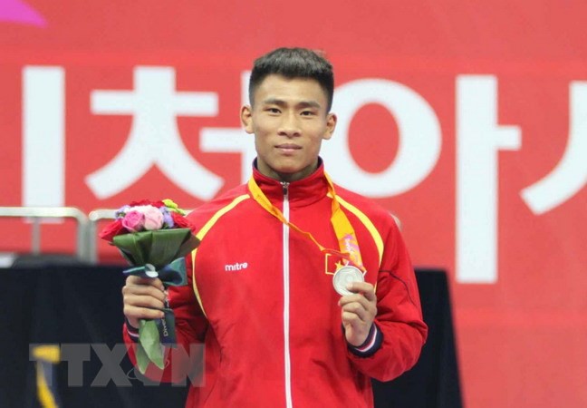 Việt Nam giành HC vàng đầu tiên tại ASIAD 2018 - Ảnh 3.