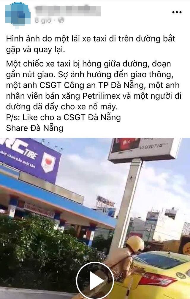 Chiến sĩ CSGT Đà Nẵng giúp tài xế taxi đẩy xe bị hỏng giữa đường, nhiều người thấy vậy cũng chạy tới góp sức - Ảnh 2.