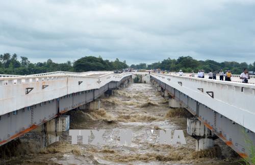 Vỡ đê tại Myanmar gây lụt lội nghiêm trọng - Ảnh 1.