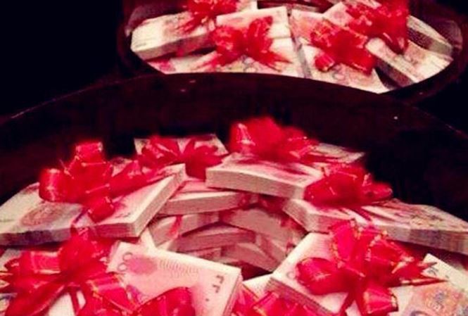 Trung Quốc: Thách cưới quá cao bị coi là buôn người - Ảnh 1. Trung Quốc: Thách cưới quá cao bị coi là buôn người - Ảnh 1.