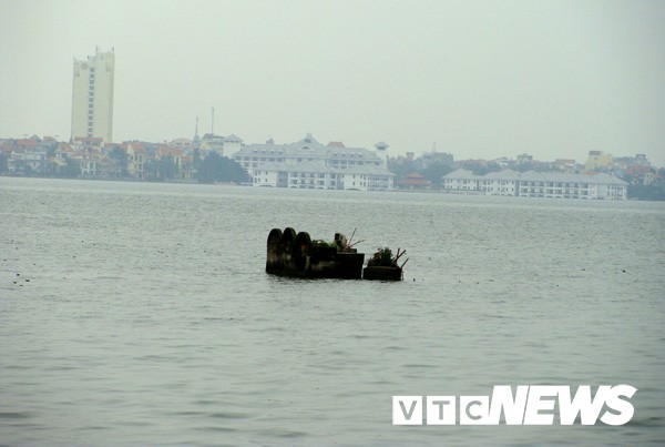 Giải mã bí ẩn về những ngôi mộ cổ thoắt ẩn thoắt hiện giữa sương khói Hồ Tây - Ảnh 1.