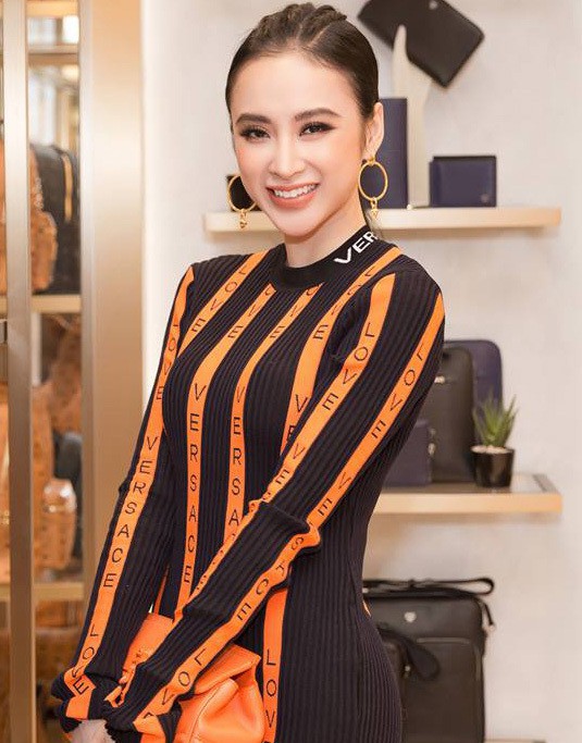 Mặc váy đầm lộng lẫy thôi chưa đủ, phải như Angela Phương Trinh chọn son môi “xuyệt tông” cùng trang phục nữa mới hoàn hảo 9 Mặc váy đầm lộng lẫy thôi chưa đủ, phải như Angela Phương Trinh chọn son môi “xuyệt tông” cùng trang phục nữa mới hoàn hảo - Ảnh 9.
