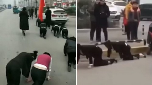 Công ty Trung Quốc phạt nữ nhân viên bò trên đường gây phẫn nộ - Ảnh 1.