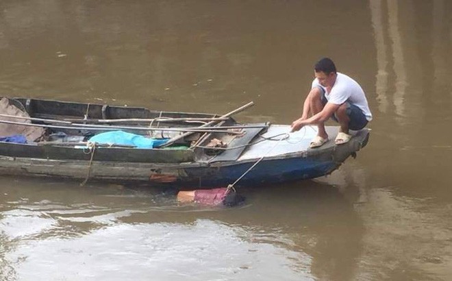 Phát hiện xác chết không mặc quần áo trôi sông ở Tiền Giang - Ảnh 1.