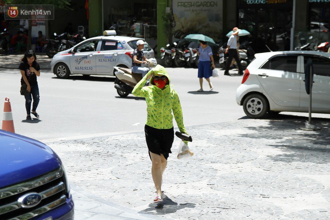 Hà Nội chuẩn bị đón đợt nắng nóng gay gắt với nhiệt độ cao nhất vượt ngưỡng 38 độ C - Ảnh 1.