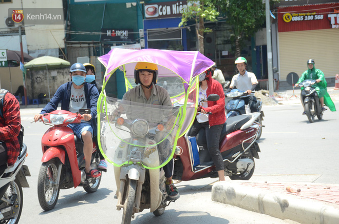 Ảnh: Người d&acirc;n Thủ đ&ocirc; vật v&atilde;, t&igrave;m đủ mọi c&aacute;ch để trốn c&aacute;i nắng hơn 40 độ - Ảnh 5.