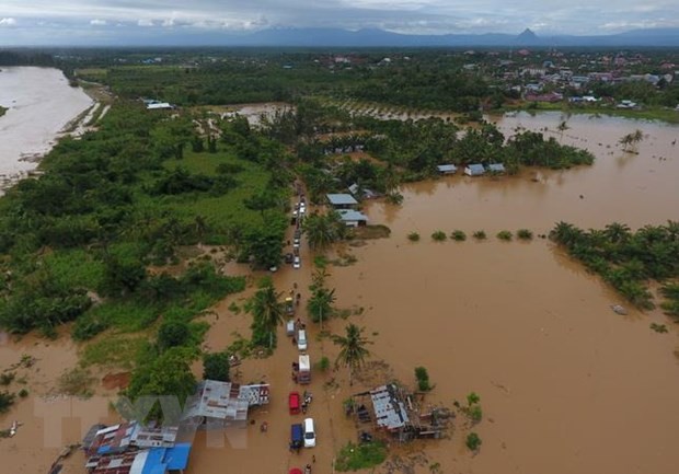 Indonesia: Hàng nghìn người phải sơ tán do lũ lụt nghiêm trọng - Ảnh 1.