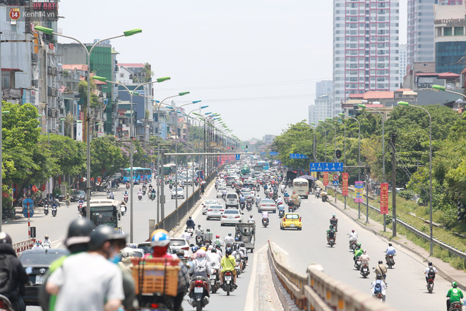 Sau ít ngày dịu mát, nắng nóng quay trở lại tại Hà Nội và các tỉnh phía Bắc - Ảnh 1.