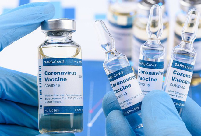 Một thử nghiệm vắc-xin Covid-19 tiềm năng vừa thông báo xuất hiện tác dụng phụ - Ảnh 1.