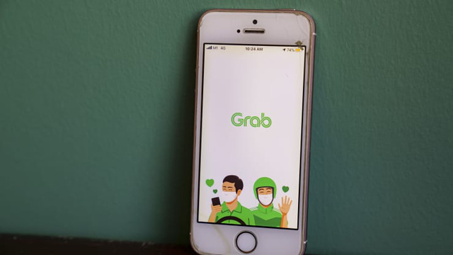 Grab chìm trong thua lỗ - Ảnh 1.