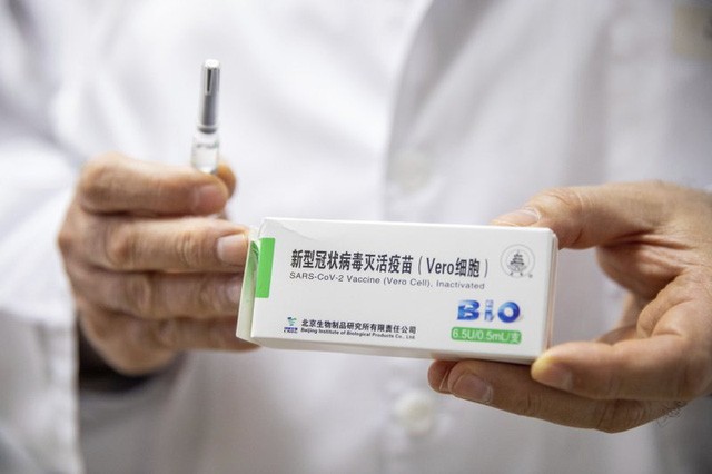 Tiêm vaccine thần tốc, hơn 1,4 tỷ dân Trung Quốc sống chung an toàn với COVID-19 - Ảnh 2.