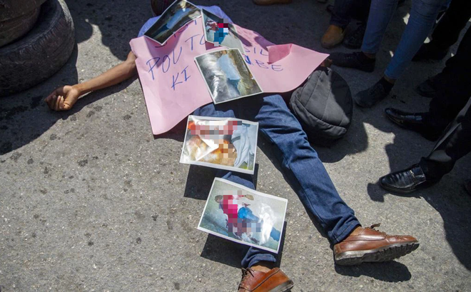 Thực hư hình ảnh được cho là thi thể đầy máu của cố Tổng thống Haiti được chia sẻ nhiều trên MXH - Ảnh 1.