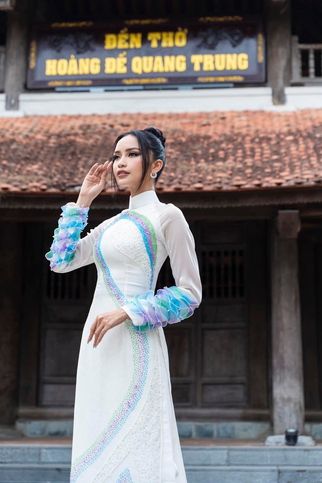 Các người đẹp Việt gợi ý mẫu áo dài cách tân duyên dáng cho Tết 2023 - Ảnh 3.