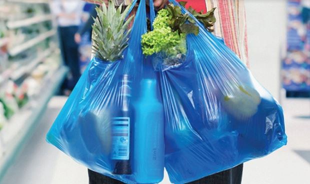 From 2026, supermarkets and shopping centers that provide disposable plastic bags to customers will be fined - Photo 1.
