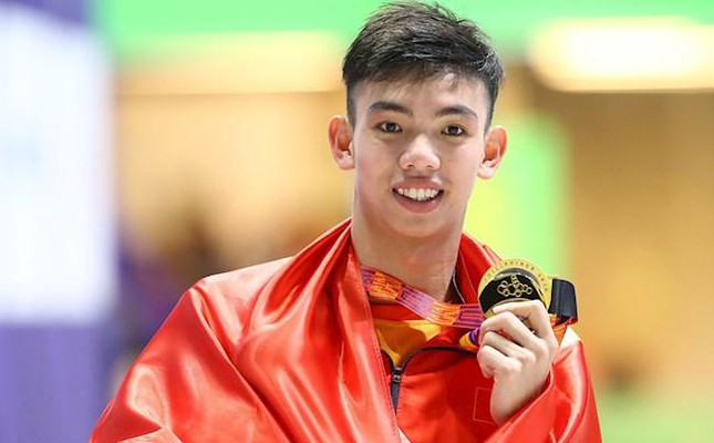 Kình ngư Huy Hoàng bất ngờ được chọn cầm cờ tại Lễ khai mạc SEA Games 31 - Ảnh 1.