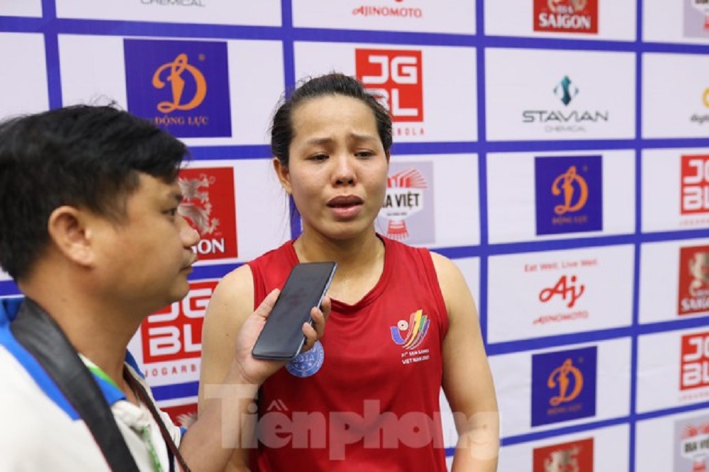 Vietnamese martial arts steel rose: Shelved her bachelor's degree in preschool, won a tearful gold medal at the SEA Games - Photo 1.