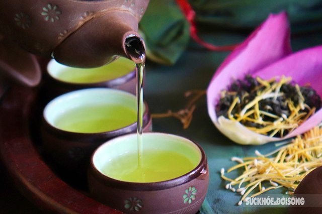 The feat of marinating tea encapsulates the quintessence of thousands of West Lake lotus flowers - Photo 7.