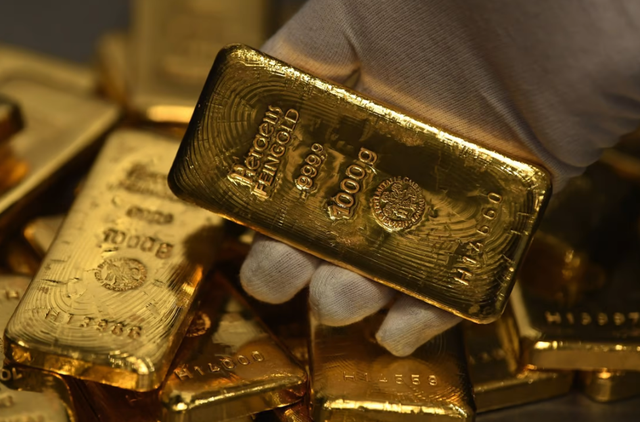 Giá vàng trong nước bốc hơi gần triệu đồng mỗi lượng - Ảnh 2.