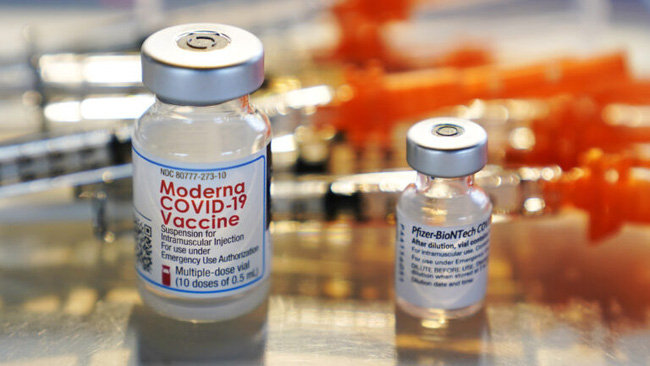 Moderna kiện Pfizer-BioNTech vi phạm bằng sáng chế đối với vaccine COVID-19 - Ảnh 1.