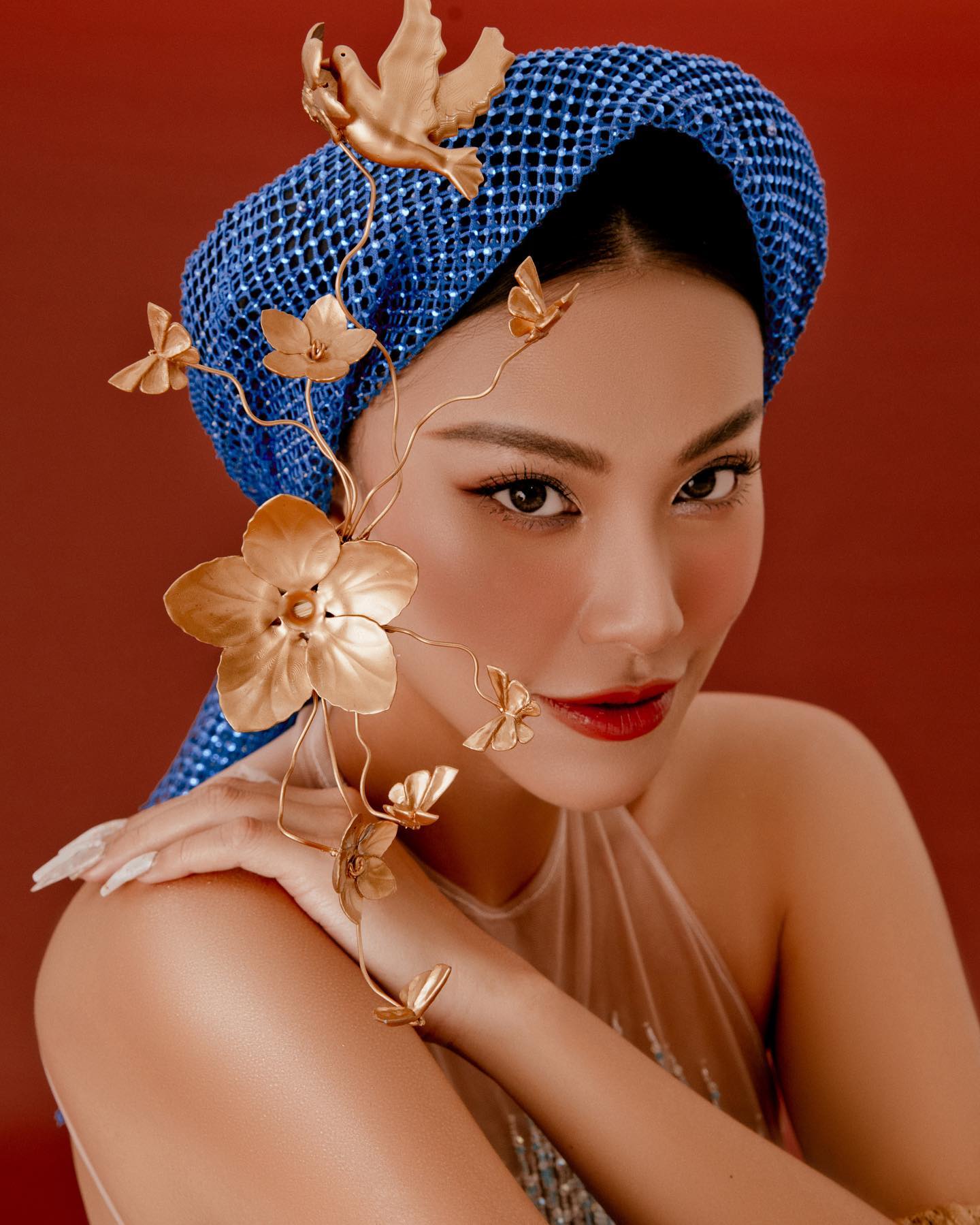 Á hậu Siêu quốc gia Kim Duyên gợi cảm trong bộ ảnh Tết độc đáo - Ảnh 1.