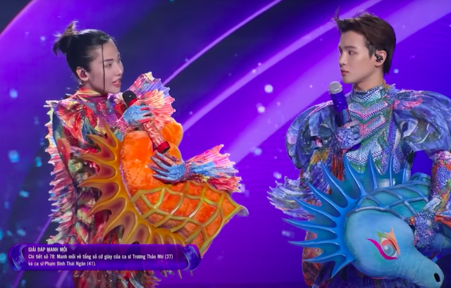 Ca sĩ mặt nạ ng&agrave;y c&agrave;ng đ&aacute;nh đố kh&aacute;n giả: Tung gợi &yacute; v&ocirc; l&yacute; đến mức kh&ocirc;ng ai đo&aacute;n được - Ảnh 5.