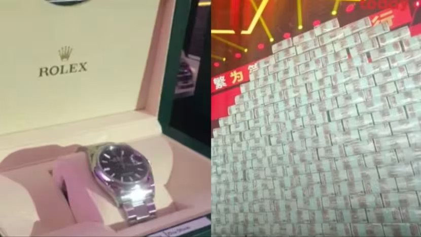 Choáng trước 'phần thưởng' kỳ lạ của công ty châu Á: Tặng miễn phí 98 đồng hồ Rolex, núi tiền mặt cao tới 2m