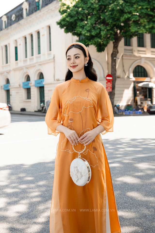 &Aacute;o d&agrave;i Tết 2024: Thời tiết nắng ấm, đ&acirc;y l&agrave; mẫu &aacute;o d&agrave;i ch&acirc;n &aacute;i lọt v&agrave;o mắt xanh c&aacute;c chị em - Ảnh 19.