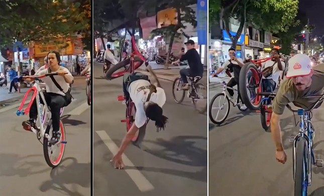 Nhóm người nước ngoài đi xe đạp bốc đầu, đánh võng trên đường phố Hà Nội - Ảnh 1.