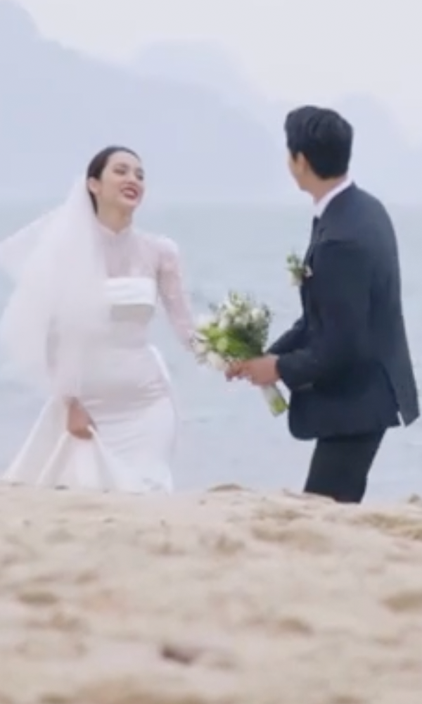 Diện váy cưới kín đáo, thanh tao, Quỳnh Lương hé lộ khoảnh khắc hậu trường nhìn thôi cũng thấy xót - Ảnh 7.