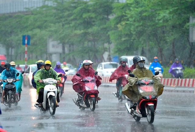 Miền Bắc mưa lạnh trong ngày Quốc tế Phụ nữ 8/3 - Ảnh 1.