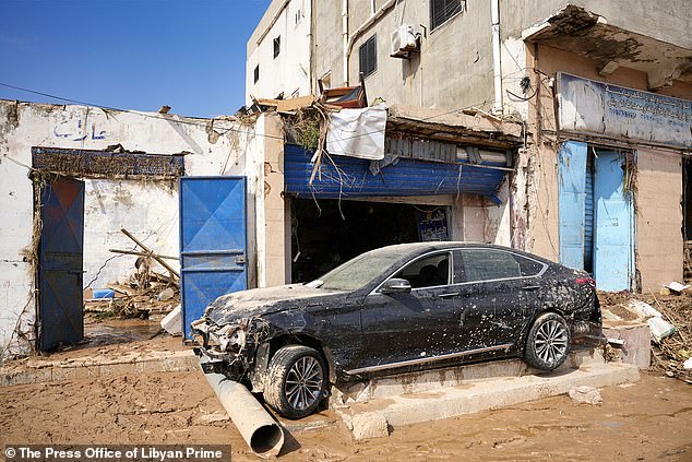 Loạt ảnh cho thấy mức độ càn quét kinh hoàng của lũ lụt khiến thành phố Derna bị tàn phá, 2.000 người nghi thiệt mạng - Ảnh 4.