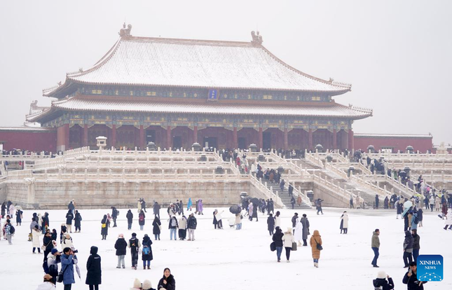 Tuyết rơi dày đặc giúp du lịch Trung Quốc ăn nên làm ra - Ảnh 1.