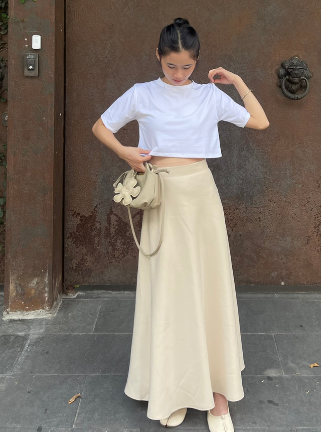 Tủ đồ của phụ nữ Pháp không thể thiếu chân váy lụa: Diện kiểu slay lúng liếng hay thanh lịch công sở đều over hợp - Ảnh 16.