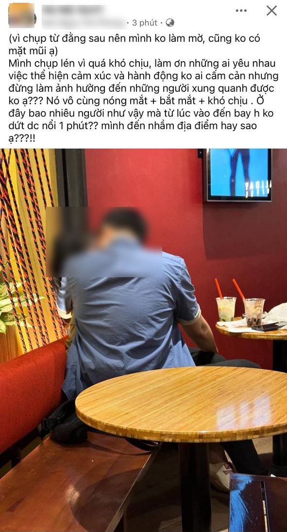 X&ocirc;n xao h&igrave;nh ảnh cặp đ&ocirc;i &ocirc;m h&ocirc;n nhau giữa qu&aacute;n c&agrave; ph&ecirc; khiến d&acirc;n mạng tranh c&atilde;i: Liệu nơi c&ocirc;ng cộng th&igrave; c&oacute; thể thoải m&aacute;i như vậy? - Ảnh 1.