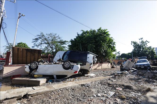 Gần 130 người thiệt mạng và mất tích do mưa lớn kéo dài ở Mexico- Ảnh 2. Gần 130 người thiệt mạng và mất tích do mưa lớn kéo dài ở Mexico- Ảnh 2.