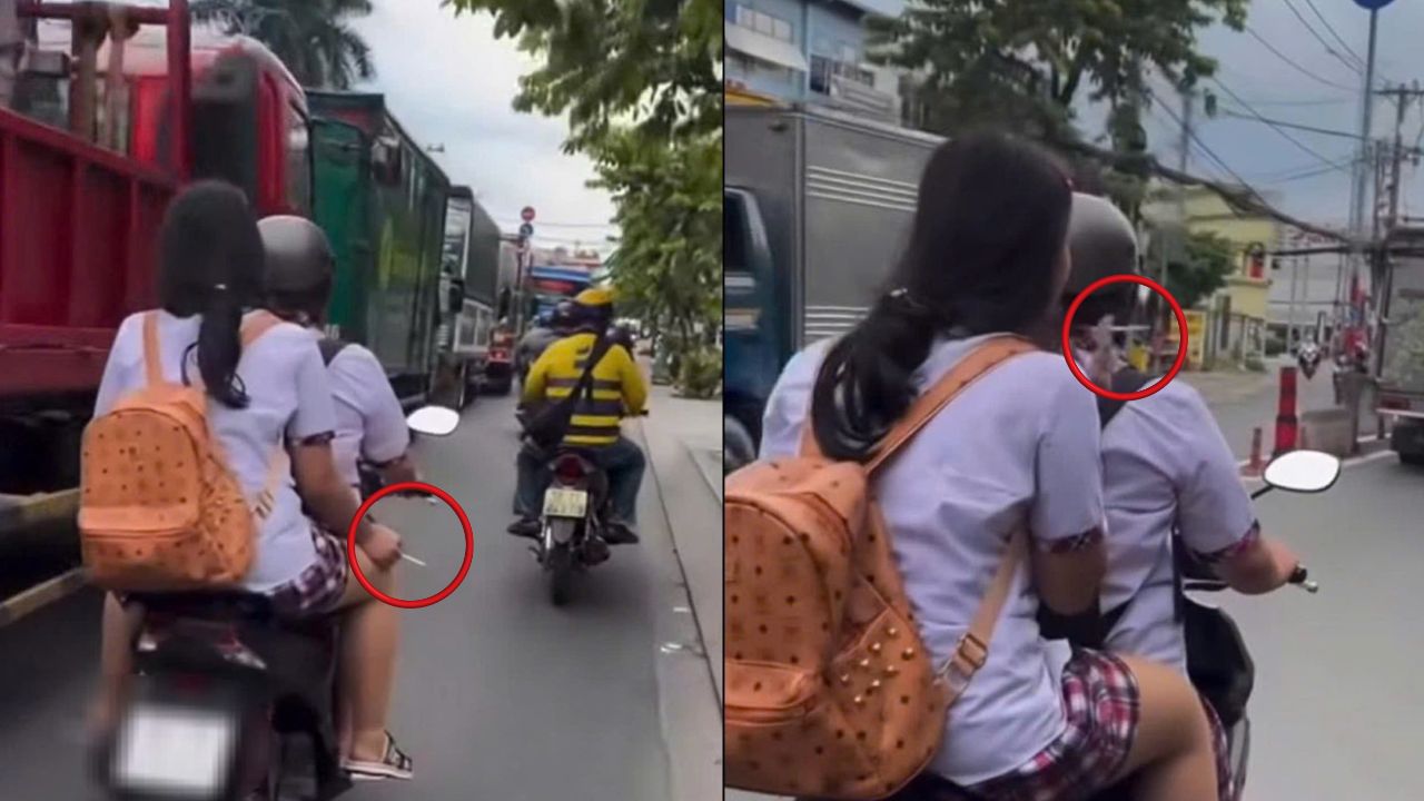 CLIP: Hai nữ sinh vừa chạy xe máy vừa hút thuốc ở TP HCM- Ảnh 1.