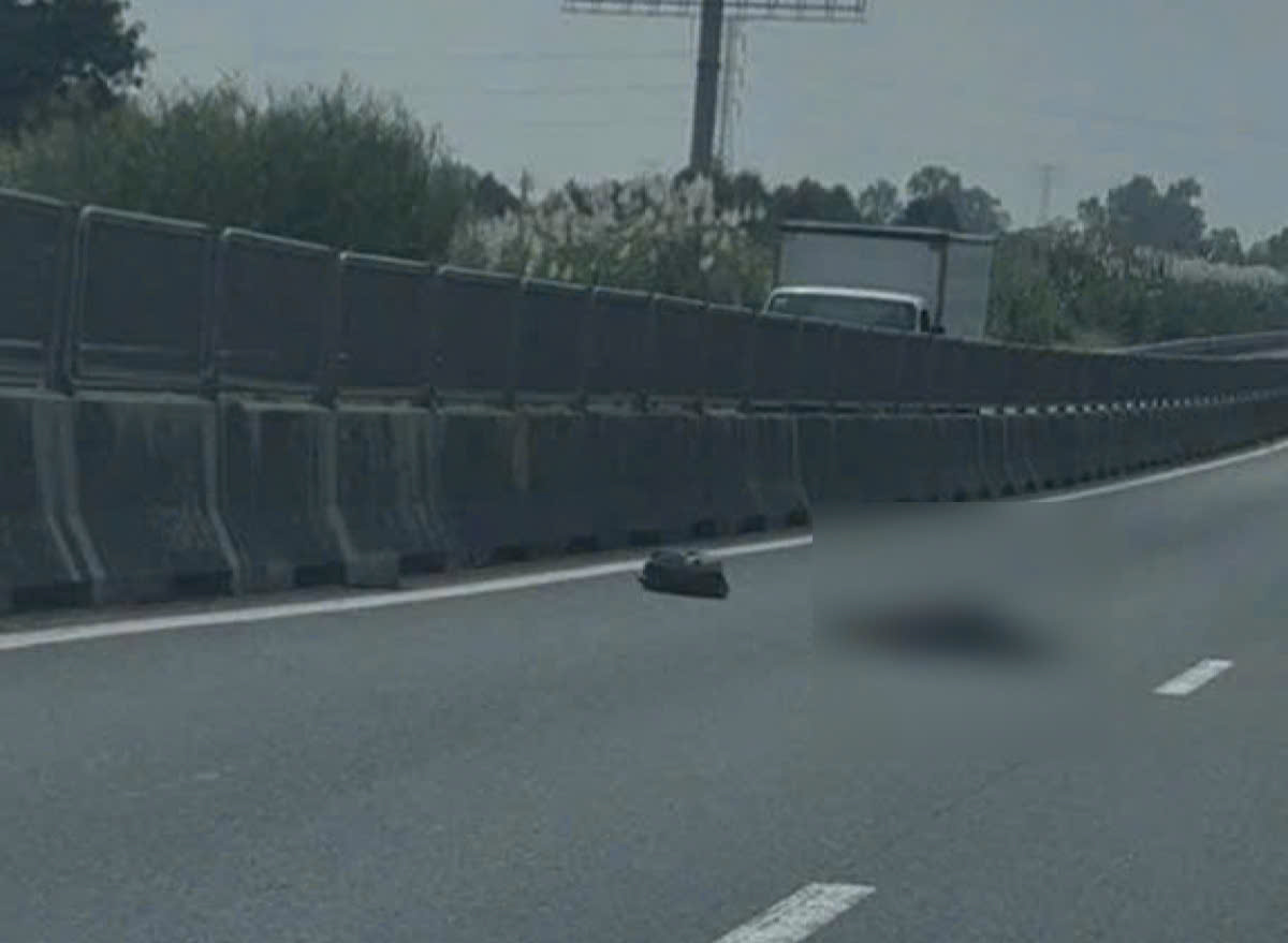 Phát hiện thi thể người nước ngoài trên tuyến cao tốc Trung Lương – Mỹ Thuận- Ảnh 2.