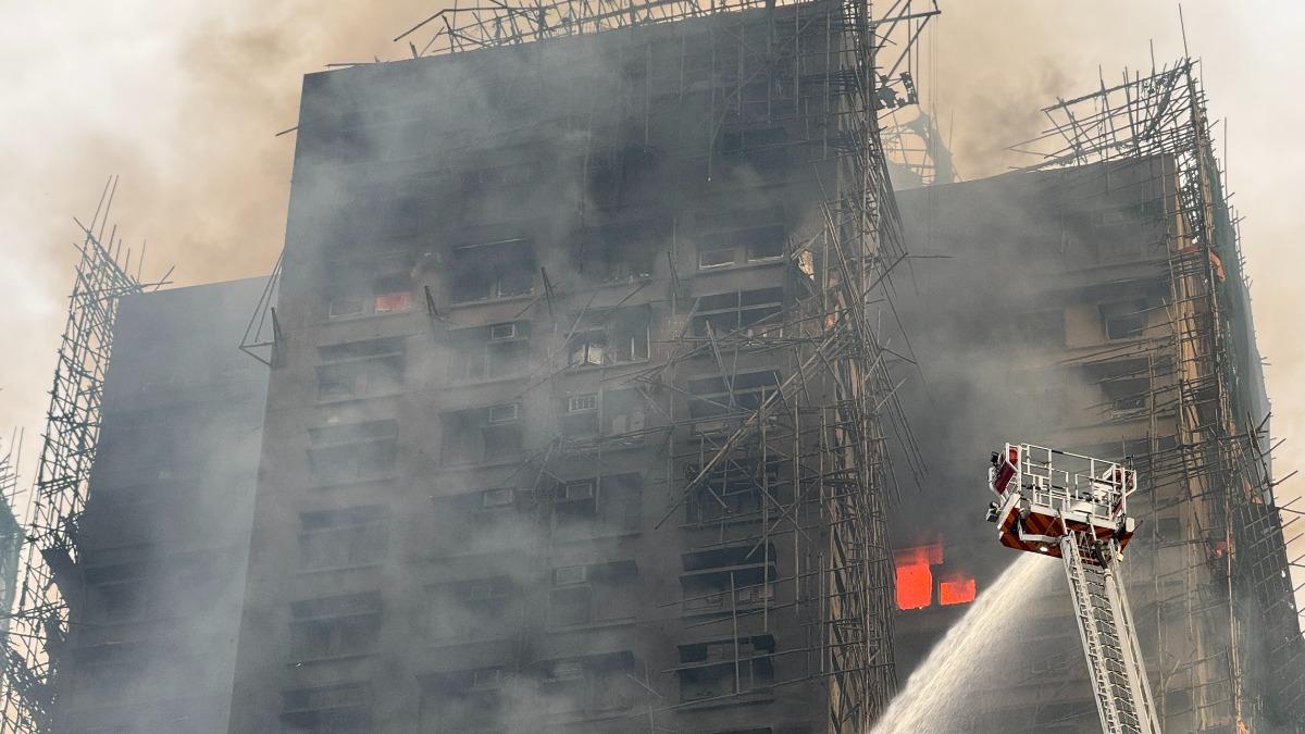 Cuộc gọi sinh tử tạo ra phép màu trong vụ cháy gần 20 tiếng ở Hong Kong (Trung Quốc)- Ảnh 2.