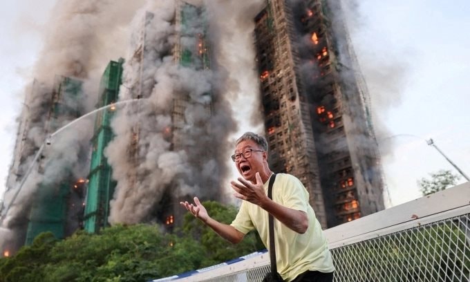 Vụ cháy chung cư ở Hong Kong: Vì sao đặc khu giàu có vẫn dùng giàn giáo từ thời Vạn Lý Trường Thành?- Ảnh 1.