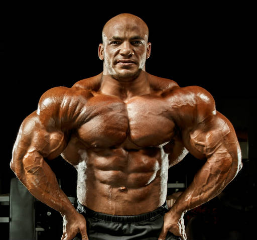 Quái vật thể hình nặng 155 kg, nhìn khối cơ bắp dày đặc, lưng dày như tường thành khiến tất cả sững sờ- Ảnh 2.