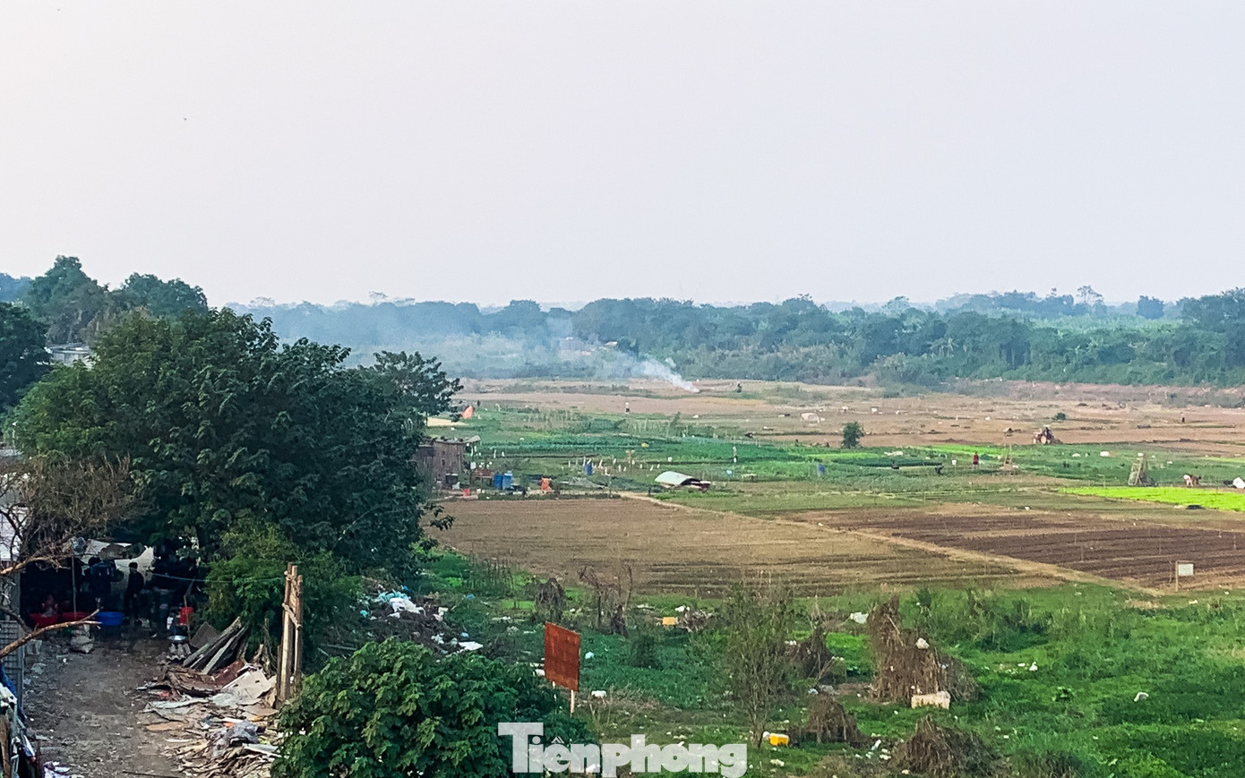 Hà Nội "chìm nghỉm" trong ô nhiễm không khí- Ảnh 14.