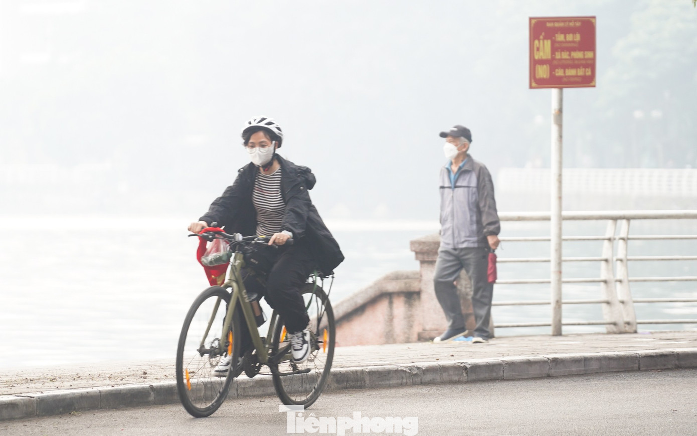 Hà Nội "chìm nghỉm" trong ô nhiễm không khí- Ảnh 5.